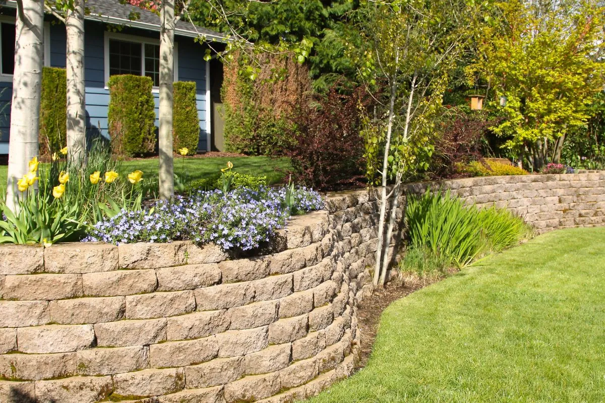 Finished retaining wall integrated into Charlotte landscape